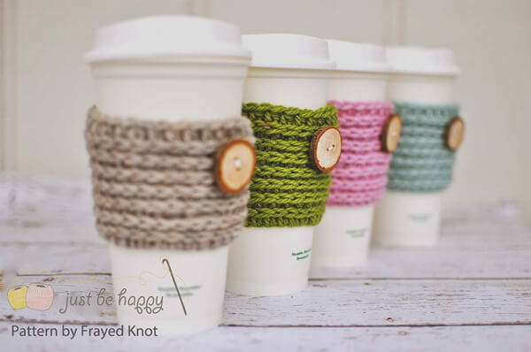 Free crochet patterns to improve your office: travel mug snug by Frayed Knot on Laughing Hens